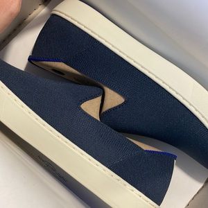 Brand new Rothy’s navy blue sneakers. Women’s size 10. Never worn.